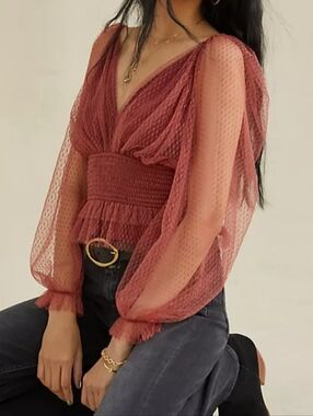 Anthropologie Sheer Tulle Sleeve Smocked Waist Peplum Top in burgundy. 